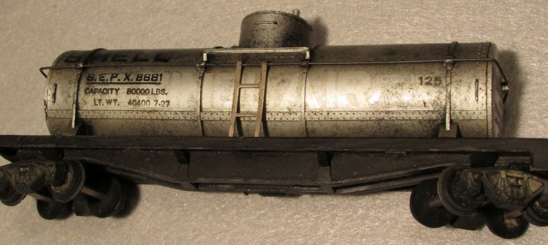 Shell Over Sinclair Tank